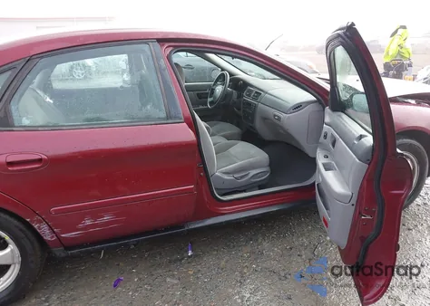 2005 Ford Taurus Se z USA, uszkodzony, nr VIN 1FAFP53245A245164